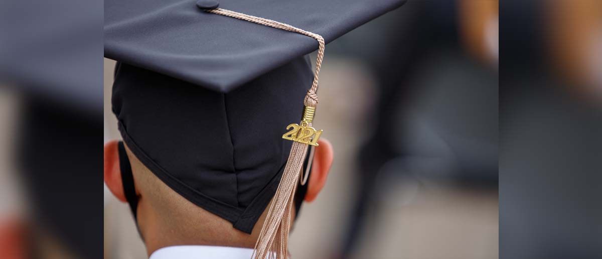 Back of a graduate's cap showing 2021 tassel