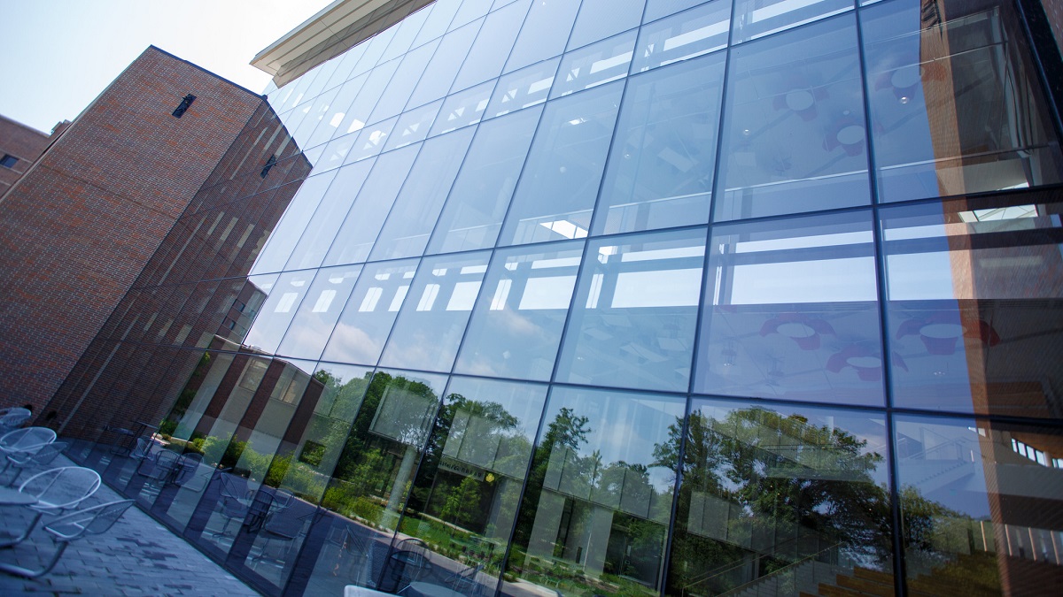 Outside close-up of the Minskoff Pavilion's glassed wall
