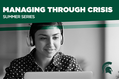 A black and white image of a woman using a laptop and wearing headphones. White text on a green background at the top of the image reads: Managing through crisis summer series.