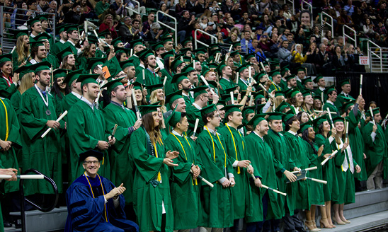 A large group of graduates at a past commencement ceremony