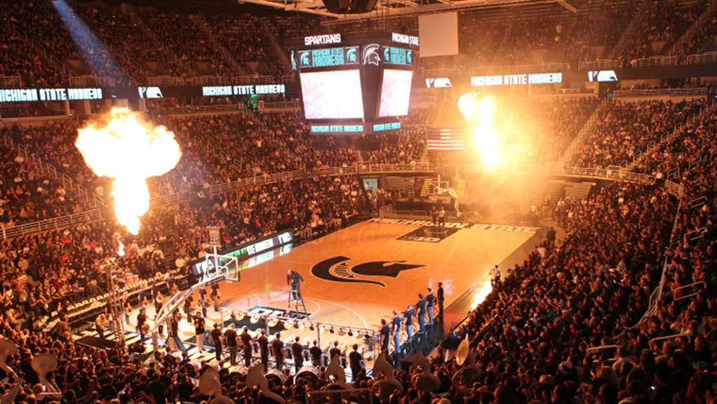 Pyrotechnic effects go off during Michigan State Madness at a packed Breslin Center