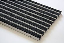 Paillasson VARIO JUNIOR JPO / JPSO, profil en aluminium couvert de fibres polyamide de chez ROSCO